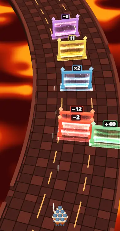 Bunte Gates mit Werten wie +40, ×2 und −12 auf einer kurvigen Straße über Lava.